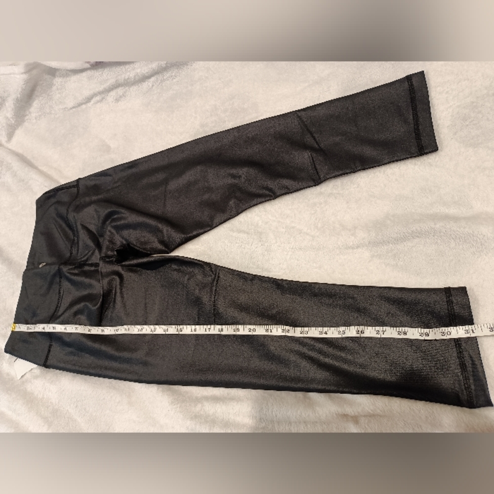 Stretchy black tights with body-tight fit